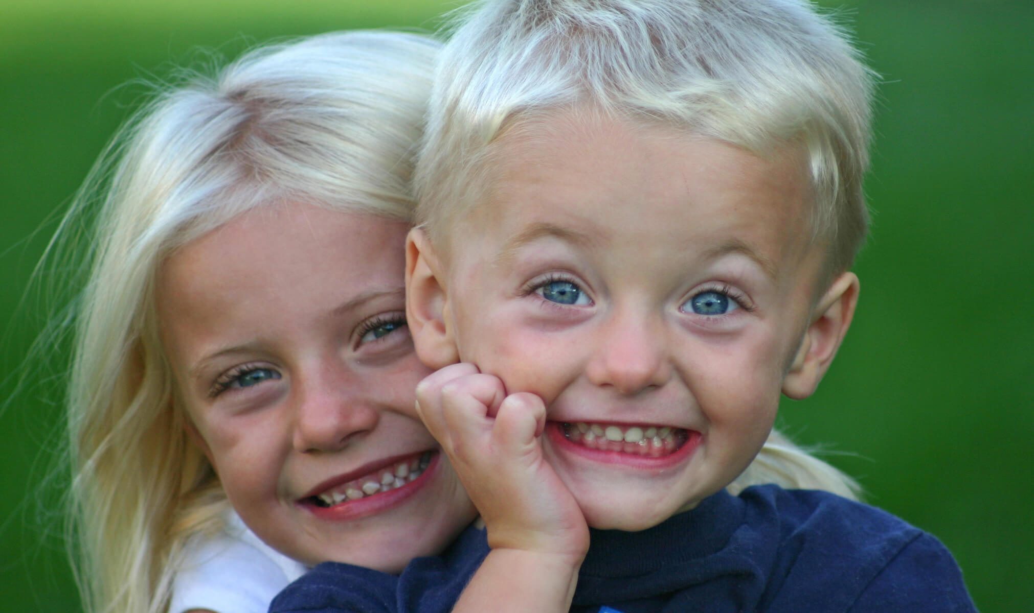 siblings smiling siblings smiling
